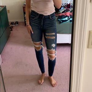 Super high waisted ripped skinny jeans